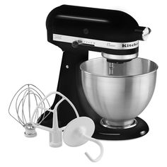 an image of a kitchen aid mixer set up with attachments for mixing and whisk