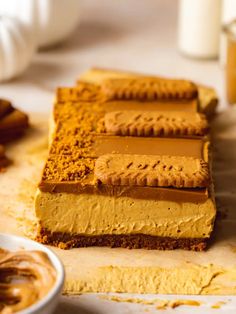 Biscoff Pumpkin Cheesecake Bars - Addicted to Dates Biscoff Pumpkin Cheesecake, Pumpkin Spice Cream Cheese, Vegan Pumpkin Cheesecake, Pumpkin Spice Cream, Biscoff Recipes, Monster Munch, Blondie Bar, Pumpkin Cheesecake Bars, Avocado Pudding