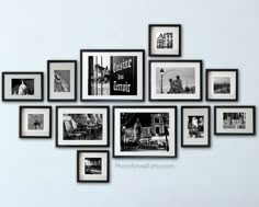 a bunch of black and white pictures hanging on a wall