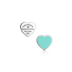 Inspired by a key ring we debuted in 1969, the Return to Tiffany collection is famous for its signature motif. These sterling silver stud earrings reinvent the classic by pairing two styles of the iconic heart tag together, one set with a diamond and the other accented with Tiffany Blue® enamel finish. Wear them on their own as a statement pair or partnered with studs for maximalist style. Sterling silver with Tiffany Blue® enamel finish and a diamond; Carat weight .005; Motif size, mini; Instan Amex Black Card, Every Jewels, Tiffany Key Ring, Rowing Blazers, Tiffany And Co Jewelry, Bauble Bar, Tiffany Earrings, Return To Tiffany, International Jewelry