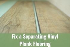 a close up of a wooden floor with text overlay that reads fix a separating vinyl plank flooring