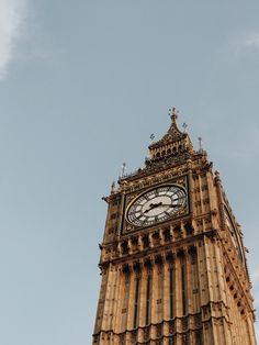 the big ben clock tower towering over the city of london