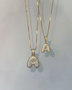 The famous bubble letter necklace Y2K style. Hailey Bieber loves it, Alix Earle loves it, everyone loves it! 'Cause it's cute! Who doesn't want a lil' dainty 3d letter neckalce with their own initial! ∙ Made of brass, copper, cubic zirconia stones - you can spend your summer days in the beach with this necklace and it will never tarnish or break.✨ ∙ Luxurious feel - gold or silver plated, by your choice, it will make you bling anywhere. It even feels a bit heavy! ∙ Trendy - stay up to date with the latest trendy jewelry like these bubble initial necklaces, they go well with any clothing! Shipping & Processing Times: 1-4 days processing. 4-10 business days FREE shipping! Refunds/Returns: I give back all of the money spent per customers request! (For 30 days, after delivery) Have any additio A Necklace Initial, Hailey Bieber Necklace, Bubble Letter Necklace, Alix Earle, Necklace Y2k, Gold Bubbles, Bubble Letter, Bubble Necklaces, Bubble Letters