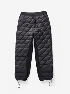 An easy sweatpant silhouette optimized for technical ultralight warmth and supreme comfort. Made from a featherlight 7D Japanese nylon insulated with 750 fill traceable down. Featuring a custom knit waistband and Polartec Powerstretch Pro® gusset for breathable flexibility when you're on the move. Abrasion resistant overlays at seat and hem for extra durability. A technical solution for cold city streets and outdoor excursions. Model is 6' 1", 31” Waist, 33” Chest and wears a size M. Size Waist Sporty Parachute Pants With Elastic Cuffs For Outdoor, Sporty Winter Parachute Pants For Outdoor Activities, Sporty Parachute Pants For Winter Outdoor Activities, Sporty Parachute Pants For Outdoor Winter Activities, Black Relaxed Fit Sweatpants For Outdoor, Sporty Sweatpants For Outdoor Winter Activities, Winter Nylon Parachute Pants For Streetwear, Functional Nylon Parachute Pants For Winter, Functional Parachute Pants For Winter Outdoor Activities