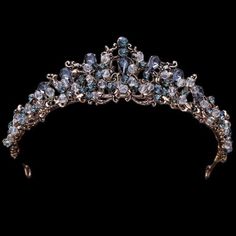 Dare this magnificent princess wedding tiara in black crystal stones on a golden zinc alloy structure. This tiara will give a romantic and unique touch to your hairstyle and wedding dress. If you have chosen a fairy tale, romantic chic or boho chic theme for your wedding then don't hesitate any longer, this tiara is made for you! And for even more custom beauty, take a look at our store! You will find a beautiful and wide range of wedding accessories such as wedding jewelry, wedding jewelry, boh Silver Crown With Blue Jewels, Light Blue Tiara, Blue Tiara, Tiara Wedding Hair, Blue Crystals Stones, Soft Pink Theme, Crystal Tiara, Tiara Wedding, Headpiece Jewelry