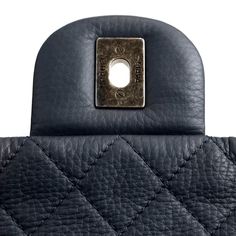 This Chanel Navy Classic Travel XXL Flap Bag is in pristine condition. Most certainly the chicest way to travel, this extra-large Classic Flap will get you there in style. Deep navy-blue textured calfskin is quilted in signature Chanel diamond pattern. Ruthenium interlocking CC twist lock secures the single front flap. Grey fabric lined interior. Leather and chain entwined strap may be carried single or double. Made in France. Intact hologram and dust bag included. Measurements: 17” x 11” x 5” drop: 11”/ 19” PBF 12376 Grey Chanel Classic Flap, Chanel Classic Zipped Coin Purse, Navy Chanel Flap Bag, Chanel Vintage Jumbo Flap, Navy Chanel, Chanel Vintage Classic Double Flap Bag Quilted Lambskin Medium, Versace Watch, Chanel Flap Bag, Gucci Watch