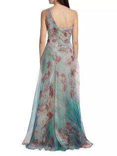 This elegant gown by Rene Ruiz Collection flaunts a fit-and-flare silhouette in a whimsical printed organza fabrication..One-shoulder neckline.Sleeveless.Back invisible zip closure.100% polyester.Lining: 100% polyester.Dry clean.Imported.SIZE & FIT.About 64' from shoulder to hem.Model measurements: 5'10' tall.Model is wearing a US size 4.This elegant gown by Rene Ruiz Collection flaunts a fit-and-flare silhouette in a whimsical printed organza fabrication.One-shoulder necklineSleevelessBack invisible zip closure100% polyesterLining: 100% polyesterDry cleanImportedSIZE & FITAbout 64' from shoulder to hemModel measurements: 5'10' tallModel is wearing a US size 4 Silk Evening Dress With Floral Print And Fitted Bodice, Organza Dress With Floral Print For Evening, Floral Print Gown With Fitted Bodice For Gala, One-shoulder Organza Gala Dress, One-shoulder Organza Dress For Gala, Silk Dress With Floral Print And Asymmetrical Neckline, Silk Floral Print Floor-length Evening Dress, Organza Gown With Sweep Train, Floral Print Gown With Fitted Bodice For Evening