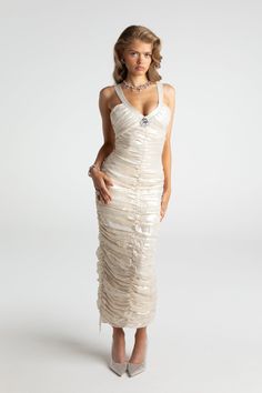 Luxury Ruched Evening Dress For Wedding, Elegant Silver Backless Evening Dress, Silver Backless Evening Dress For Wedding, Elegant Shimmer Evening Dress, Elegant Gold Shimmer Evening Dress, Elegant Shimmer V-neck Evening Dress, Glamorous Shimmer Evening Dress For Wedding, Elegant Sparkling Champagne Dresses, Elegant Shimmer Evening Dress For Prom