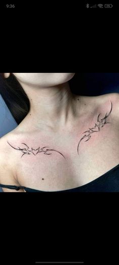 a woman's chest with the word love written in cursive writing on it