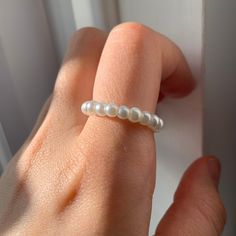 PLEASE READ: Make sure you take your ring of to wash your hand/swim etc to keep it in best possible condition  Size - ring comes in Small, Medium and large - - - -however it can be made in any UK ring size if you message me  Made - I make the earring to order  - handmade Colour - white Pearl  Customisation  - this product also comes in a bundle containing a matching pair of Pearl earrings  - if you have any requests message me  Shipping -Free Uk shipping Questions  - feel free to message me with Casual Adjustable Rings For Summer, Adjustable Trendy Crystal Ring For Wedding, Dainty Adjustable Hypoallergenic Pearl Ring, Trendy White Rings For Summer, White Pearl Stackable Jewelry, Adjustable Trendy Pearl White Jewelry, Trendy Adjustable Pearl Ring, Trendy White Crystal Open Ring, Adjustable Beaded Rings For Summer