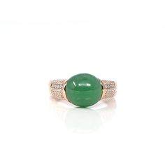 * ORIGINAL DESIGN --- Inspired by the natural beauty of genuine Burmese Imperial Green Jadeite, the rich, beautiful apple green color is found on no other stone. This one of a kind engagement ring combines the natural beauty of the extremely rare gem with everyday luxury. Exquisite designs add details to admire and uniqueness to your everyday memento. This ring features a round cabochon Jadeite. Color is photographed exactly to the actual stone, it's free of any inclusions that are visible to th Green Jade Rings, Jade Engagement Ring, Apple Green Color, Jade Rings, Green Oval, Everyday Luxury, Jade Ring, Rare Gems, Jade Jewelry