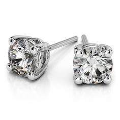 A special pair of 4.5 mm 1/2 ctw moissanite stud earrings in white gold. The sparkling round cut studs are safely set into a white gold four-prong setting with a combined total weight of 0.58 carats. Diamond Earrings For Men, Diamond Earrings Studs Round, Fashion Hairstyles, Earrings For Men, Solitaire Pendant Necklace, Solitaire Studs, Moissanite Earrings, Gifts For Girlfriend, Gold Diamond Earrings