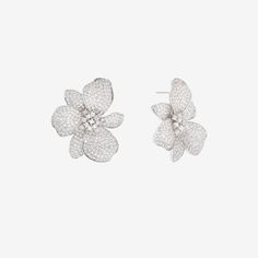 Our Eden Stud Earring features a combination of fine, delicate detail and romantic nostalgia. Hand-set pave stones encompass this floral inspired stud silhouette earrings. Easy to wear elegance. 925 sterling silver AAAA+ grade cubic zirconia pave measurement: 40mm/1.57in Luxury Floral Bridal Earrings For Formal Events, Luxury Bridal Earrings In Flower Shape For Formal Events, Luxury Floral Shaped Bridal Earrings For Formal Occasions, Luxury Floral Bridal Earrings For Formal Occasions, Glamorous Flower-shaped Wedding Earrings, Glamorous Formal Flower Earrings For Pierced Ears, Elegant Diamond Flower Earrings For Wedding, Luxury Flower Shaped Diamond Wedding Earrings, Luxury Flower Earrings For Formal Occasions