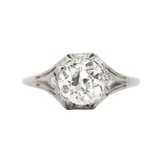 Item Details: Ring Size: 6.75 Metal Type: Platinum [Hallmarked, and Tested] Weight: 3 grams Center Diamond Details: GIA REPORT #2205833496 Weight: 1.52 carat Cut: Old European Brilliant Color: M Clarity: SI1 Side Diamond Details: Weight: .20 carat, total weight Cut: Antique Single Cut Color: G Clarity: SI Finger to Top of Stone Measurement: 7.4mm Condition: Excellent Brilliant Engagement Rings, Edwardian Engagement Ring, Contemporary Engagement Rings, Engagement Ring Art Deco, Platinum Diamond Engagement Rings, Art Deco Diamond Rings, Art Deco Engagement, 1920s Art, 1920s Art Deco