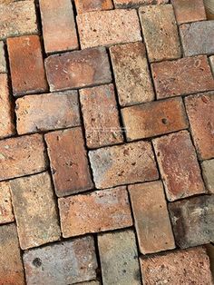 an old brick floor is shown in close up