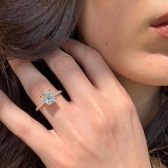 a close up of a person wearing a ring