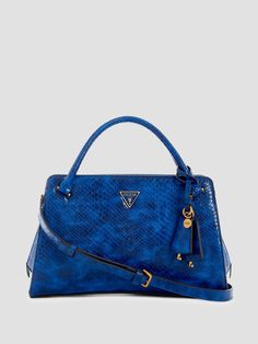 Faux-leather satchelPython textured constructionAntique bronze hardwareEnameled triangle logoMultiple interior pocketsZip-top closureTop handles with 3.5" drop. Detachable strap with 22.75" drop.12.5"W x 8"H x 4.25"D Leather Satchel, Clutches, Fashion Ideas, Satchel, Women Handbags, Handles, Faux Leather, Backpacks, Leather