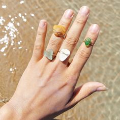 Handmade wure wrapped rings with recycled seashells and sea glass found on florida beaches. These rings are made with 18k gold filled wire so they are naturally water proof and will not tarnish. Select your correct ring size for purchase. Hand Wrapped Green Jewelry For Beach, Handmade 14k Gold Filled Jewelry For The Beach, Handmade Beachy Green Jewelry, Dainty Green Jewelry For Beach, Bohemian 14k Gold Filled Jewelry For Beach, Unique Gemstone Jewelry For The Beach, Seashell Ring, Minimalist Beach Jewelry Ring, Minimalist Sea Glass Jewelry For Beach