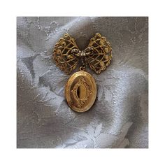 Authentic vintage brooch pin with hanging locket. A few stones missing (as pictured), but in beautiful used vintage condition. Antique Medallion Brooch Jewelry, Victorian Gold Brooch With Locket, Victorian Gold Locket Brooches, Victorian Gold Pendant Brooches, Gold Brooch With Vintage Charm For Collectors, Vintage Filigree Pendant Brooch, Vintage Filigree Pendant Brooches, Antique Pendant Brooches For Formal Occasions, Antique Pendant Brooch For Formal Occasions