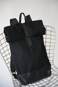 Black Laptop Backpack - Black Leather Backpack - Vegan backpack - Rolltop Backpack - Minimalist Backpack - Big laptop Rucksack - Travel Backpack - Back to School - Big Black Bag, Black Backpack, Black Leather Bag, Laptop Backpack, Black Canvas Bag, Black Rolltop Bag, Travel Backpack,School Backpack - Made to order - allow 7 days to create it for you - Original pattern and design - Handmade by me with care and love - Made from Sturdy black drill fabric and black faux leather fabric, the lining is Practical Black Backpack For On-the-go, Black Backpack For Commuting, Modern Black Leather Backpack For School, Rectangular Black Backpack With Leather Backing, Practical Black Everyday Backpack, Functional Black Leather Backpack For On-the-go, Practical Black Backpack For Everyday, Black Backpack With Adjustable Strap For Commuting, Black Commuting Backpack With Adjustable Strap