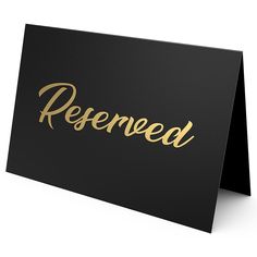 a black and gold greeting card with the word reserved on it