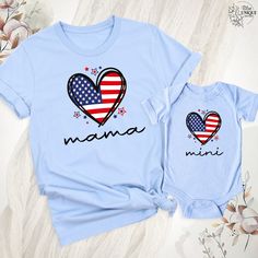 two matching shirts with the words mama and baby in american flag heart shapes on them