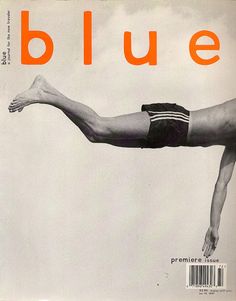 the cover of blue magazine features a man diving