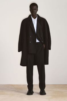 DOUBLE-FACED WOOL COAT - Black - COS Cos Coat Wool, Black Double-breasted Wool Coat With Concealed Placket, Black Wool Coat With Concealed Placket And Lapel Collar, Oversized Double-breasted Wool Coat For Formal Occasions, Black Wool Coat With Lapel Collar, Black Long Pea Coat With Concealed Placket, Solid Wool Long Coat With Concealed Placket, Solid Color Wool Coat With Concealed Placket, Classic Black Wool Coat With Concealed Placket