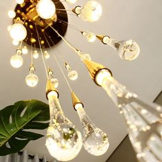 a chandelier with lights hanging from it