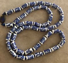 "Vintage Fine China Floral Blue and White Porcelain Barrel Beads and Cloisonne Clasp Necklace. Size: 25\", Beads- 3/16\"x 7/16\". Markings: None. No chips. Just Beautiful and smooth. Sold as is. Pre-Owned." Traditional Blue Jewelry With 8mm Beads, Traditional Blue Beaded Necklace With 8mm Beads, Traditional Blue Beaded Necklaces With 8mm Beads, Azurite Ring, Blue And White Porcelain, Clasp Necklace, Just Beautiful, Fish Bone, Necklace Size