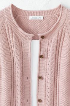 Our texture-rich cardigan is designed with a pattern of pointelle-knit chevron accents and rolled trim. A just-right weight for layering.