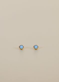 Your new everyday favorite - a classic circular stud with a fire opal stone in the center. Tarnish Free - Long lasting protective coating safeguarding your jewelry from sweat, water, and more.Sterling Silver Posts �– 18K gold plating over brassHypoallergenic – Lead FreeLab-grown Opal Stone Opal Earring, Dainty Opal Earrings, Gold Opal Round Earrings, Opal Stud Earring, Opal Earrings Stud Rose Gold, Fire Opal Earrings, Simple Stud Earrings, Opal Studs, Small Earrings Studs