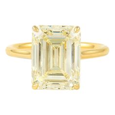 Stunning modern diamond solitaire ring. High jewelry by Alexander Beverly Hills HRD graded 6.02 carat emerald cut diamond, M color grade, and VS2 clarity grade. 18-karat yellow gold, current ring size 6.5. Accommodated with an up to date appraisal by a GIA G.G., please contact us with any questions. Thank you. HRD Report Number 180000169503 Item Number APC1112 Yellow Emerald Cut Ring, Luxury Yellow Gold Emerald Cut Crystal Ring, Yellow Emerald Cut Engagement Ring, Yellow Emerald Cut Diamond Ring, Luxury Emerald Ring With Single Diamond, Modern Emerald Ring With Gia Certified Diamond, Luxury Emerald And Diamond Ring, Modern Gia Certified Emerald Ring With Diamond, Yellow Gold Square Cut Emerald Diamond Ring