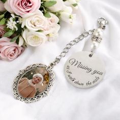 a bouquet of flowers and a keychain with a photo on it