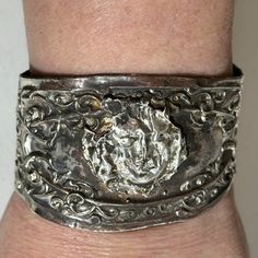 Thank You For Looking At This Handmade One Of A Kind Cuff Bracelet Made With Antique Victorian Sterling Silver The Sterling I Used Is Over 100 Years Old I Soldered A Sterling Antique Face To Antique Sterling And Created This Cuff The Face To Me A Bit Like A Gothic Demon I Preserved This Stunning Antique. Saved From " Destruction In History By Forging It Into A Cuff. Fits Medium- Wrists,6.25- 6.75 , Slightly Adjustable , I Can Make It Smaller Or Larger, Just Contact Me For Adjustment Tested Sterl Artistic Silver Jewelry With Stamped Details, Artistic Silver Jewelry, Stamped, Artistic Silver Jewelry Stamped, Ornate Silver Hand Cast Jewelry, Artistic Silver Bangle Bracelets, Artistic Silver Bangle Bracelet, Silver Hallmarked Cuff Bracelet, Elegant Stamped Silver Cuff Bracelet, Artistic Silver Bangle Jewelry