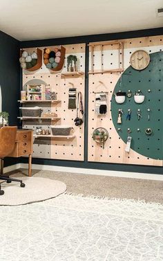 a room with two pegboard wall mounted to it's sides and several pieces of jewelry hanging on the walls