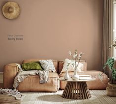 a living room with a couch, table and potted plants on the coffee table