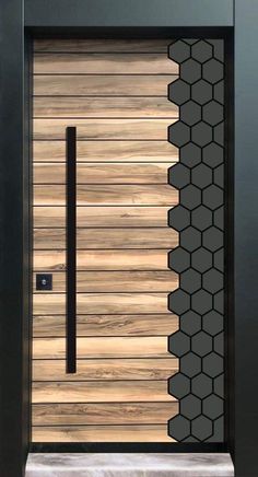 a modern wooden door with geometric designs on the front and side panels, as well as a black metal handle