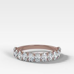 This Petite Shared Prong Wedding Band with Oval diamonds is perfect for those that want something a bit more subtle. The 3.5mm wide band consists of tiny oval cut diamonds with a petite shared prong setting that allows maximum sparkle with minimal bulk. 3.5 mm band available in rose, yellow and white gold Oval Diamond Ring For Wedding And Anniversary, Dazzling Oval Diamond Ring With Single Cut Diamonds, Oval Lab Grown Diamond Ring For Formal Occasions, Oval Diamond Cut Anniversary Ring, Oval Moissanite Rings With Diamond Accents For Wedding, Oval Diamond Cut Wedding Ring, Oval Diamond Cut Ring For Anniversary, Formal Oval Lab Grown Diamond Ring, Formal Oval Lab-grown Diamond Ring