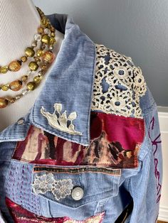 a close up of a jacket with many different items on it