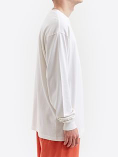 Elevate your basics with this Goodhood Worldwide crisp white long sleeve sleeve crewneck t-shirt, featuring a single breast pocket. 100% Cotton Garment Dyed 300 GSM Long Sleeve Crewneck *Model is 6'2" and wears a size Large *Womens Model is 5'10" and wears a size Small Porter Yoshida, Basic Long Sleeve, Pocket Tshirt, White Long Sleeve, Single Breasted, White And Black, Dye, Size Large, Crew Neck