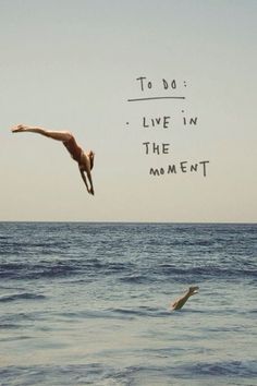 a man dives into the ocean with his feet in the air and words above him that read to do, live in the moment