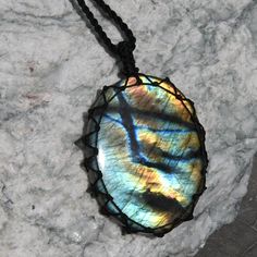 Beautiful handmade Macrame rainbow Labradorite pendant, with an adjustable black necklace cord. The magical Labradorite is believed to protect against the negativity and misfortunes of this world and enhances spiritual growth, intuition, and awareness. This necklace is the perfect meaningful gift for your loved one or yourself! ►►This is a one-of-a-kind necklace, you will receive EXACTLY the one seen in the photos! *'¨) ¸.*'¸.**'¨) ¸. (¸.*' (¸.*` ♥ *FREE INTERNATIONAL SHIPPING ►►Pendant size: St Supernatural Gifts, Boho Pendant Necklace, Macrame Rainbow, Woven Necklace, Necklace Cord, Witchy Jewelry, Gifts For Birthday, Labradorite Jewelry, Boho Pendant