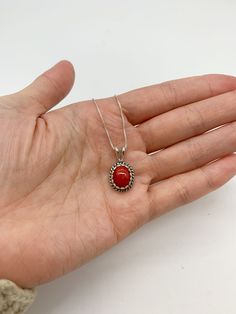 Red Coral Necklace set with a Natural Red Coral in a top grade & strong red color, at 10x8mm, 3 Cts, from Sardinia. Solid 925 Sterling Silver ☞ made to last.Matching Ring & Matching Earrings: Please ask meDetails: • Natural Red Coral sourced from Sardinia• Red Coral: 10x8mm, 3 Cts, diamond cut• Dimensions: Pendant Height 19.6mm, Width 9.2mm• Free Complimentary Chain• Solid 925 Sterling Silver ❀ Each Natural Gem is unique & will have Slight variations from the product pictures "no two Natural Sto Classic Red Jewelry As A Gift, Classic Red Hallmarked Necklace, Classic Red Necklaces For Anniversary, Red Oval Fine Jewelry, Fine Red Oval Jewelry, Red Carnelian Oval Necklace, Red Oval Carnelian Necklace, Red Jewelry With Polished Finish For Gift, Classic Red Gemstone Jewelry