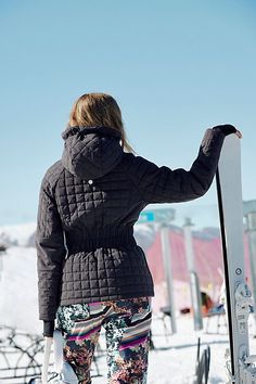 Made for the slopes, this ski-ready jacket features a fully waterproof design that keeps moisture out with a Primaloft insulated design to keep you warm while staying lightweight and locking out the cold. With a fitted silhouette and adjustable hooded neckline, you’ll stay extra cozy in cold temps, plus it’s equipped for everything you need for a ski trip from a detachable hood, lots of pockets, underarm and ski vents for air flow, and knit cuffs and thumbholes. **The Fit:** Fitted design to keep the cold out, with an adjustable wide waistband and a powder skirt at the interior **The Feel:** Down-filled with PrimaLoft insulation; warmest-level design for freezing temps; water-resistant finish **The Features:** Solid and square quilted panels, wide elasticated waist band; stash phone pocket Skiing Puffer Jacket With Detachable Hood, Hooded Nylon Puffer Jacket For Skiing, Functional Nylon Outerwear For Ski Season, Sporty Outerwear With Adjustable Hood For Snowboarding, Sporty Outerwear For Ski Season, Sporty Puffer Jacket For Ski Season, Nylon Outerwear With Adjustable Hood For Skiing, Functional Hooded Puffer Jacket For Skiing, Sporty Hooded Puffer Jacket For Ski Season