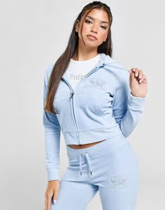 Add some old-school style to your wardrobe with this women's OG Velour Full Zip Hoodie from Juicy Couture. In an Ice Blue colourway, this JD-exclusive hoodie is cut from smooth velour fleece for everyday comfort. It features a full-zip fastening and hood for custom coverage, with ribbed trims to hold the shape and side pockets for storage. Finished up with Juicy Couture branding to the chest. Machine washable | Our model is 5'9" and wears a size small.