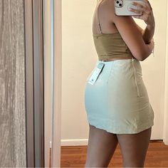 H&M Non- Stretch Khaki Mini Skirt H&m Skirt For Night Out In Spring, H&m Mini Skort For Spring, H&m Summer Skort Short Length, H&m Mini Length Bottoms For Summer, Casual Fitted Skirt By H&m, Casual Fitted Mini Skirt By H&m, H&m Skort For Summer, Fitted Casual Skirt By H&m, Chic H&m Skirt For Spring