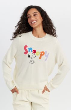 Update your off-duty repertoire with this cream sweater from our latest Peanuts collaboration. Finely knitted from a blend of wool and cashmere, this classic-fit style is detailed with a Snoopy intarsia complete with colourful lettering in a bubble font. Wear it with everything from jeans to track pants. Model is 5ft 10in and wears a size Small. Classic fit True to size 12GG Fine Knit Update your off-duty repertoire with this black sweater from our latest Peanuts collaboration. Finely knitted fr Snoopy Sweater, Cashmere Loungewear, Bubble Font, Peanuts T Shirts, Chinti And Parker, Fall Wardrobe Essentials, Cashmere Dress, Cashmere Accessories, Cashmere Jumper