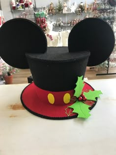 a mickey mouse hat on top of a table