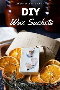 orange slices and soap in a bowl with rosemary sprigs